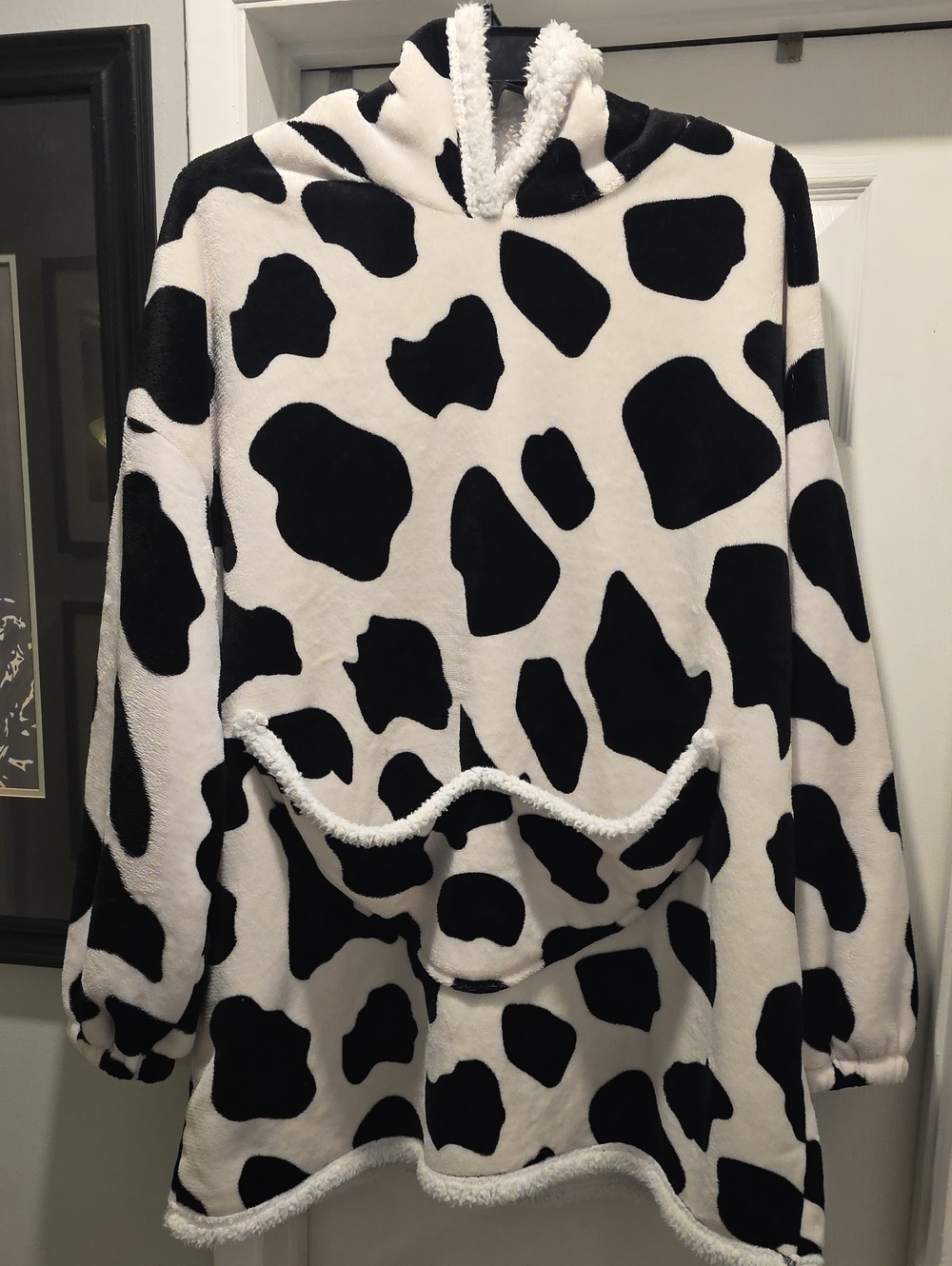 Cozy Black & White Cow Print Hooded Sweatshirt